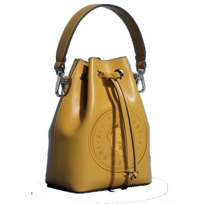 China Custom Water Resistant Logo OEM BSCI Certified Drawstring Women Mini Vegan Leather Rolling Handbag Women Shoulder Messenger Bag Bucket Bag for sale