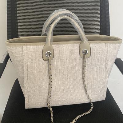 China 2022 Other New Designer Bucket Bag Women Diagonal Handheld One-Shoulder Chain Tote Bag Large Capacity for sale