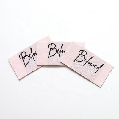 China Durable Letter Pink Patch Label Black Woven Label Sew On Woven Patch For Clothing for sale