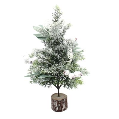 China Wholesale Holiday Use Artificial Green White Snowy Christamas Decoration PE Stand Wooden Low Christmas Tree For Indoor Outdoor Decor for sale