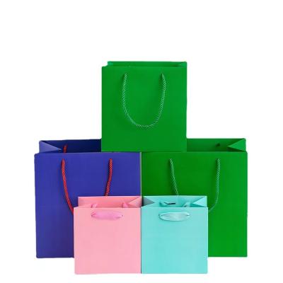 China Color Handmade Custom Shopping Bags With Logo Print Paper Handle Luxury Gift Bag for sale