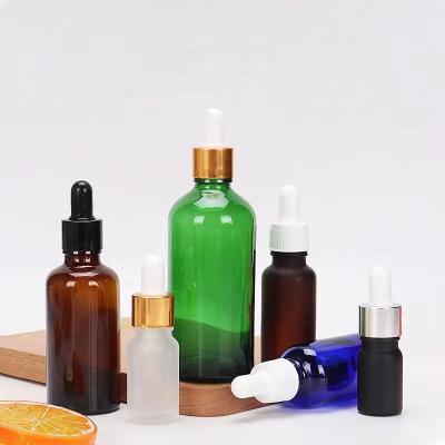 China Matte White Frosted Black Amber Clear Glass Dropper Bottle 5ml 10ml 15ml 20ml 1oz 2oz 3oz Personal Care Essential Oil Bottle With Gold Dropper for sale