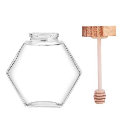 China 100ml 220ml hexagon stocked glass jar and wooden lid for sale