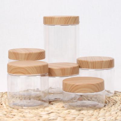 China 100ML/200ML/300ML/500ML Clear Empty Cosmetic PET Jars Containers With Lids Storage Plastic Wooden Bottle Large Capacity New for sale