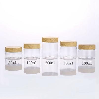 China Cosmetic in stock 100ml 150ml 250ml frosted clear with lid round shape pet bamboo cosmetic plastic jar 5oz 8oz for sale