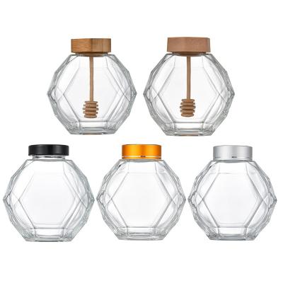 China New Food Honey Glass Bottle With Bamboo And Wooden Stick Cover 500g Hexagon Creative Honey Bottle With Lid for sale