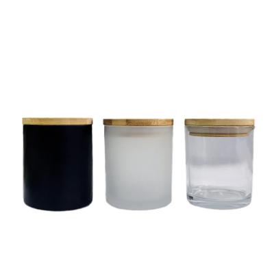 China Europen 2022 hot sale candle jars with box and lid frosted black and white glass candle jar 7oz 10oz 14 oz for sale