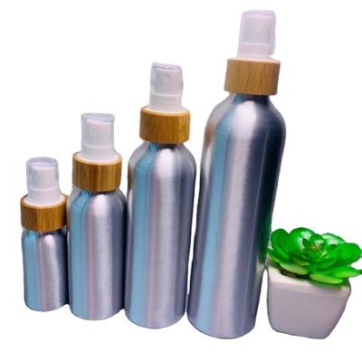 China Cosmetic bamboo spray bottle with aluminum top for sale