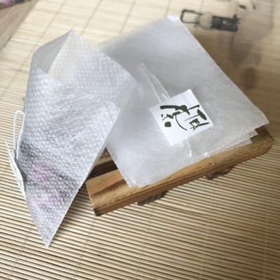 China Customized Biodegradable Empty Corn Pyramid Tea Material Heat Seal Tea Bag With Label for sale