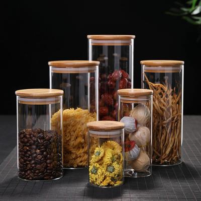 China Custom Size Freshness Preservation Storage Containers Kitchen Glass Storage Jars With Bamboo Lids for sale