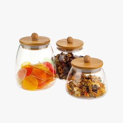 China Freshness Preservation 2021 Custom LOGO High Borosilicate Material With Wooden Ball Lid Glass Jar for sale