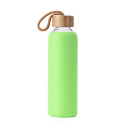 China Hot Sale High Borosilicate 450ml Stocked Glass Water Bottle With Silicone And Bamboo Sleeve Lid for sale