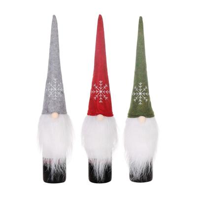 China Christmas Decoration Style Christmas Grass Bottle Cover Non-woven European Winebottle Cover For Decoration for sale