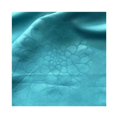 China Wholesale Memory Double Brushed Fabric Embossed Solid Dyed Textile Fabrics for sale