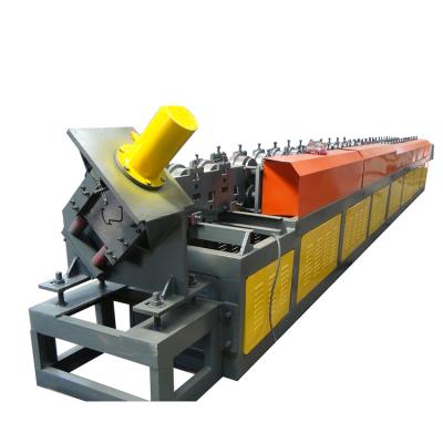 China Rib Steel Door Frame Roll Forming Machine Remote Monitoring Hydraulic Cuttting Te koop