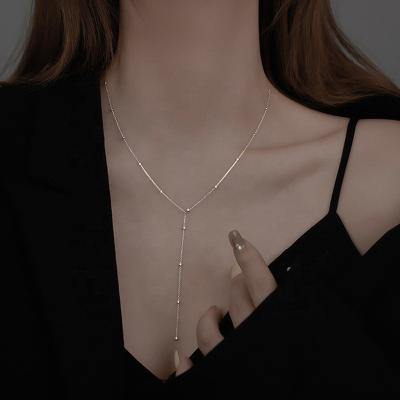 China 18k Gold Pearl Niche Design Light Luxury Collar Cold Wind Collar Sexy Low-cut Long Simple Round Clavicle Chain Fashionable Necklace for sale