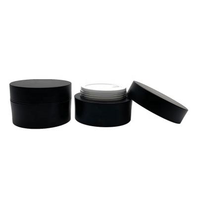 China Recyclable 2oz Jar Cosmetic Gel Black Color Material Double Walled Low Profile Jars 2oz Plastic Double Wall 2oz Cosmetic Jar for sale