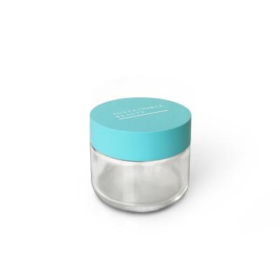 China colorful & 50g eco-friendly cream glass jar with blue bamboo lid for custom eco-friendly cosmetic packaging for sale