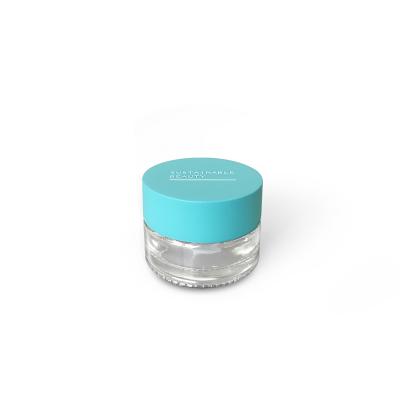 China colorful & Eco-friendly 20g face cream glass jar with blue bamboo lid for sustainable custom cream cosmetic packaging for sale