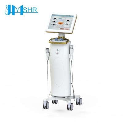 China Fractional face lift vertical rf microneedle machine for face lifting and acne removal with frozen handle for sale