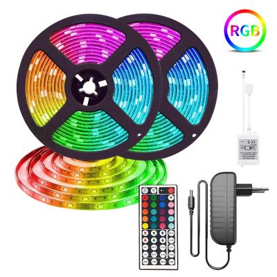 China Residential Flexible LED Strip Light 5050 RGB IP65 Ribbon Lamps 18leds/M with 44 Key IR Controller Adapter 5M 10m 15M 20M Available for sale