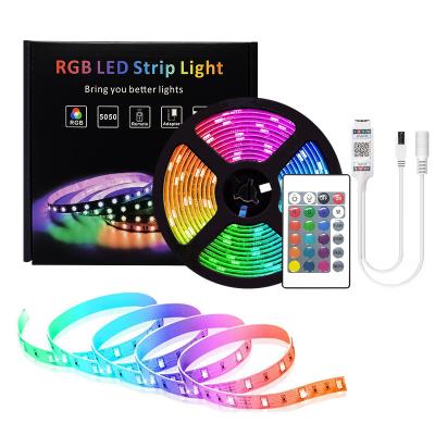 China 5M-20M BT LED Ribbon Stripe 5050 IP20 RGB LED Strip Light Residential Flexible LED Strip Light DC 12V RGB Diode IR Controller Adapter for sale