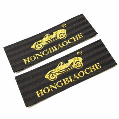 China Brand Garment Accessories High Definition Satin Polyester Garment Washable Custom Fabric Woven Label Back Neck Key Labels For T-shirt for sale