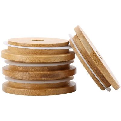 China Full Automatic Pilfer Proof Equipment Laser Cut With Different Walnuts Smoked Wooden Lids Bamboo Caps Glass Jar With Wooden Lid for sale