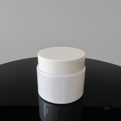 China Skin Care Cream Maker 50g Pearl White Cosmetic Containers Round Cream Glass Jar With Screw Lid for sale