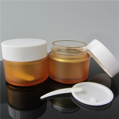 China Custom Amber Cosmetic Containers Body Glass Cream Jar Chinese Wide Mouth Skin Care Cream Supplier 100ml for sale