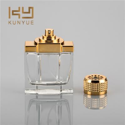 China Personal care factory wholesale high quality design 100ml empty spray glass perfume bottle with metal cap for sale