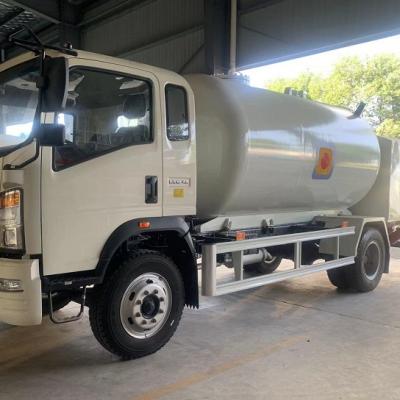 China Carbon steel 10,000Liters lpg gas filling truck dispensing bobtail for sale