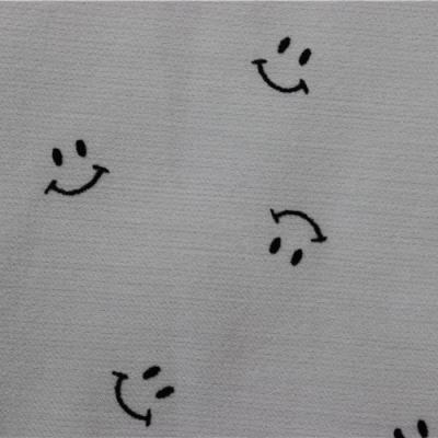 China Anti Pill Custom Design Delicate Smiley Pattern Printing Fabric Flocking Hometextile Fabric for sale