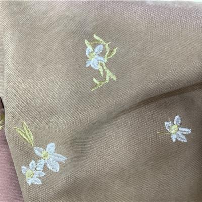 China Professional Made Anti Pill Flower Embroidered Apparel Fabrics Twill Compound Fabric for sale