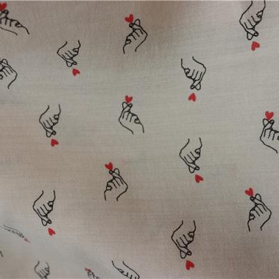 China Most Popular Anti Pill Than Heart Pattern Printing 75% Rayon 25% Polyester Printing Cheap Attractive Fabric for sale