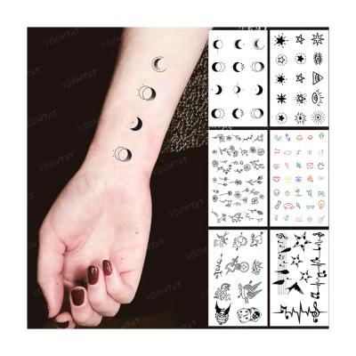 China Small Arm Mini Tattoo Star Temporary Wholesale Cross Flower Shape Planet Tatoo Waterproof Temporary Tattoo Sticker for sale