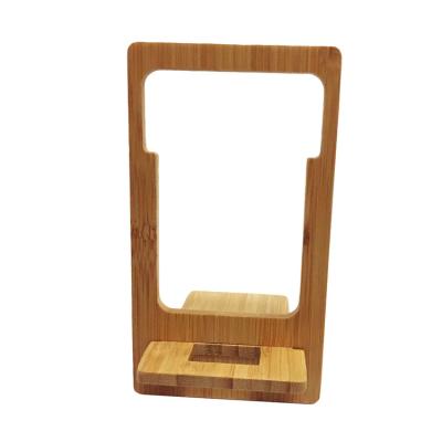 China Eco-friendly Cell Phone Stand For Lazy Man Mobile Stand Bamboo Phone Stand for sale