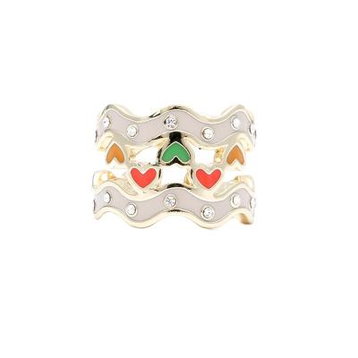 China CLASSIC Chunky Micro Colored Angel Knuckle Gold Plated Pear Shape Solitaire Moissanite Spring Ring for sale