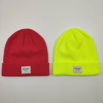 China JOINT Women Knitted Shopper Fluorescent Patch Hat Warm Winter Hat for sale