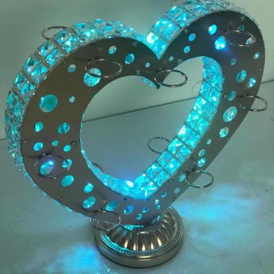 China High Quality Hardware Won't Dent Love Heart LED Lighted Metal Shot Glass Flying Tray Rotating Glass Display Stand for sale