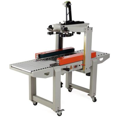 China Semi automatic food belt tape sealer crate box carton sealing machine for sale for sale