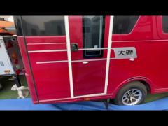 Small road trailer motorhome with complete living system suitable for outdoor play