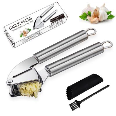 China Viable Kitchen Accessories Garlic Press Stainless Steel Meat Grinder and Crusher Garlic Squeezer for Nuts and Seeds for sale