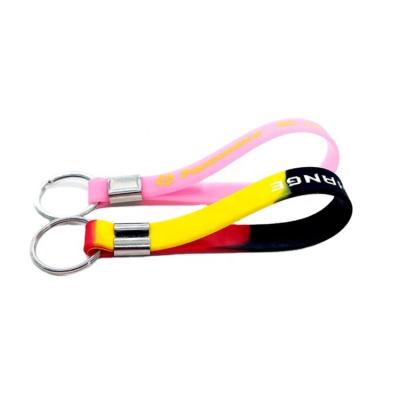 China CLASSIC Promotional Cheap Silicone Wristband Key Chain Silicone Key Holder Wristband for sale