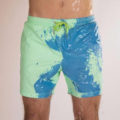 China Anti-wrinkle New Design Mens Water Color Change Shorts Magic Change Color Beach Men Shorts for sale