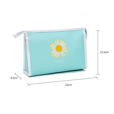 China New Design Daisy Printed Luxury Travel Organizer PU Leather Makeup Bag Fashionable Women Cosmetic Bag for sale