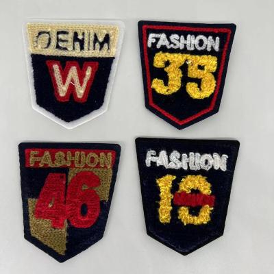 China Fshion Garment Accessories Wholesale Combination Towel Stickers Embroidered Chenille Patches Towel Stickers for sale