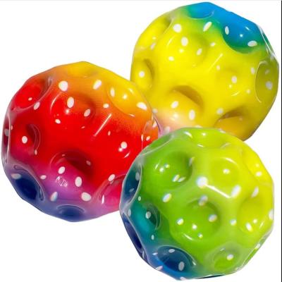 China Kids' Favorite High Resilience Moon Shape Porous Bouncy Ball with Ergonomic Design for sale