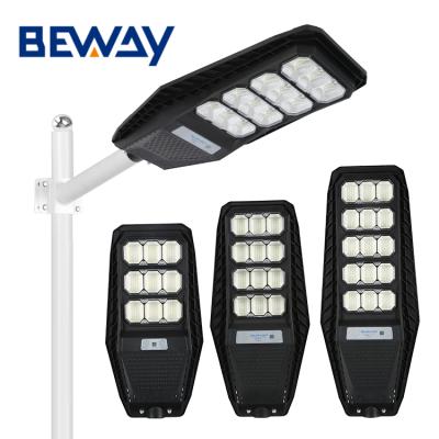 China Hot Selling Road Smd Waterproof IP65 100w 200w 300w ROAD Integrated All In One Solar Led Street Light for sale