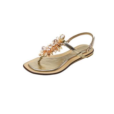 China Golden Crystal Flower Word With Light And Breathable Flip Flop Sandals Summer Flat-heel Roman Women Shoes for sale